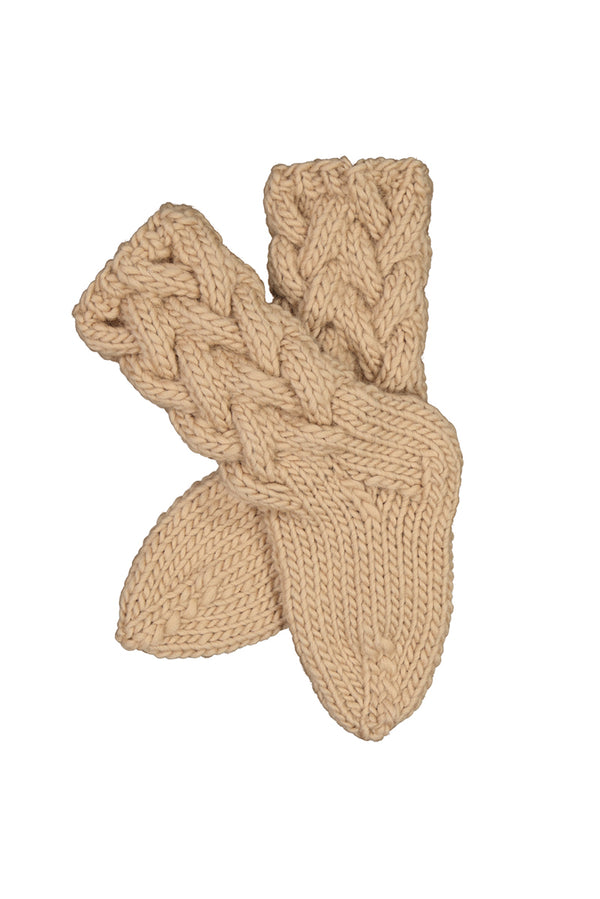 Kaarna handknitted woolen socks in oat. Product picture. Hálo from north