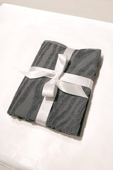 Kaarna handtowel folded with a white ribbon. Perfect gift. Hálo from north