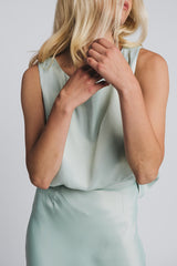 Kajo loose top in misty green worn with matching kajo slip skirt in misty green. Hálo from north
