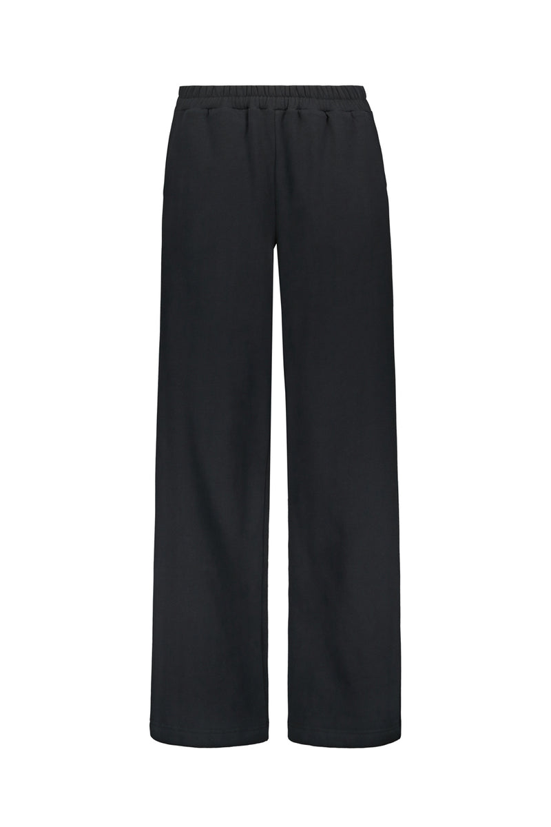Tundra woolen wide college pants in black. Front picture of the product. Hálo from north