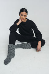 Tundra woolen college in black paired with matching woolen college pants in black. Hálo from north