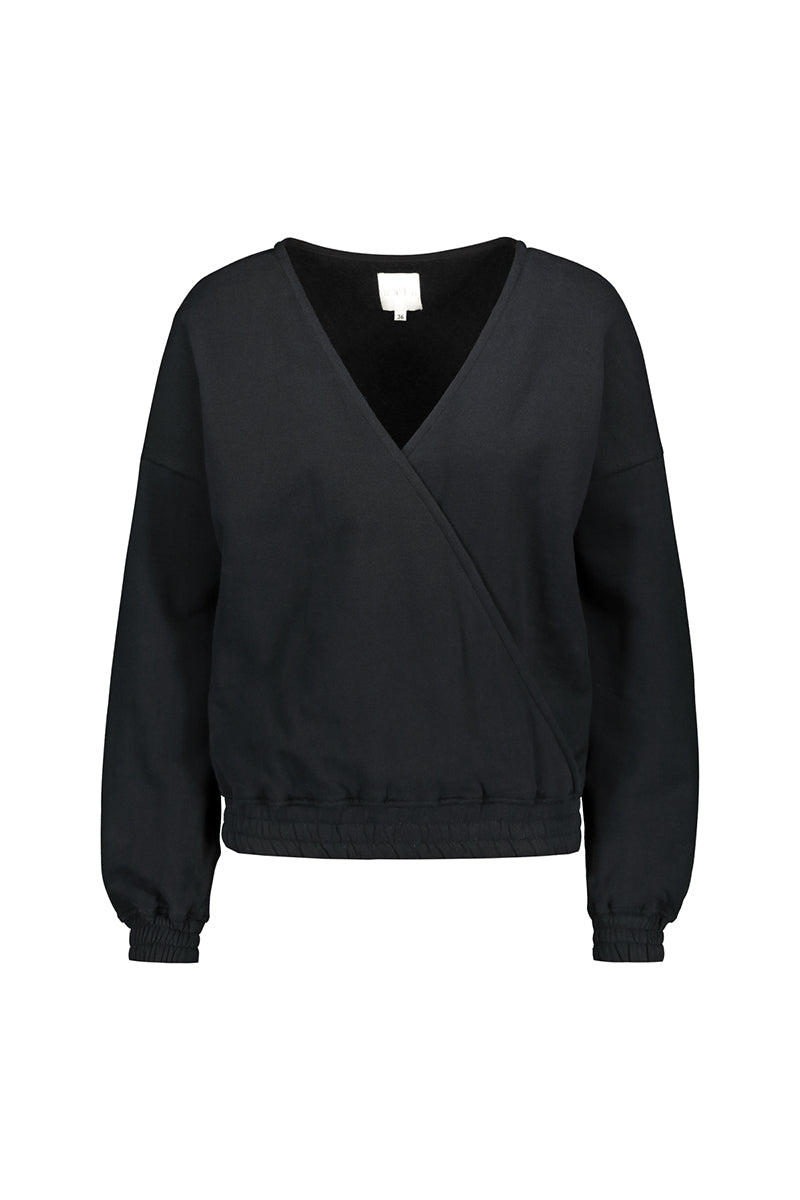 Tundra woolen wrap college in black. Front picture of the product. Hálo from north