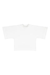 Tundra box shirt in white laid flat to show its boxy cut and kimono sleeves. Hálo from north